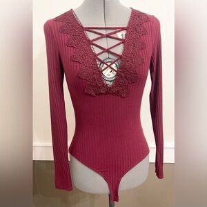 Charlotte Russe Burgundy Red Bodysuit Size M Crisscross Crochet Lace Trim Ribbed